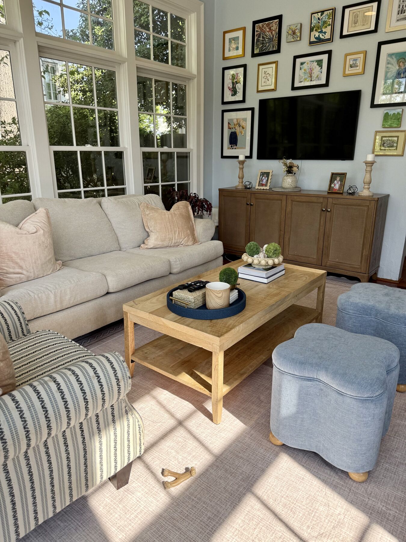 Light-filled family room with gallery wall