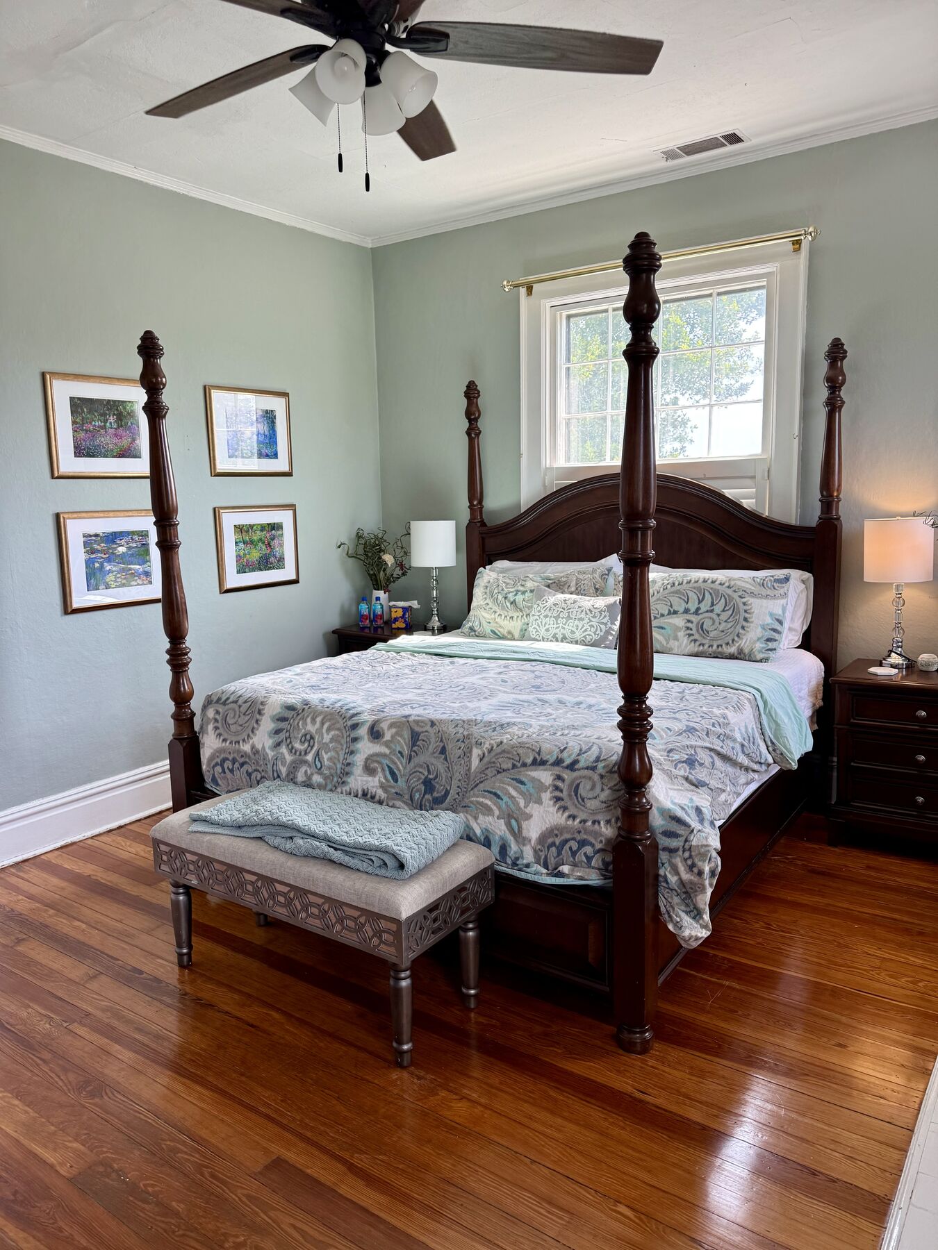 Primary bedroom with four-poster bed
